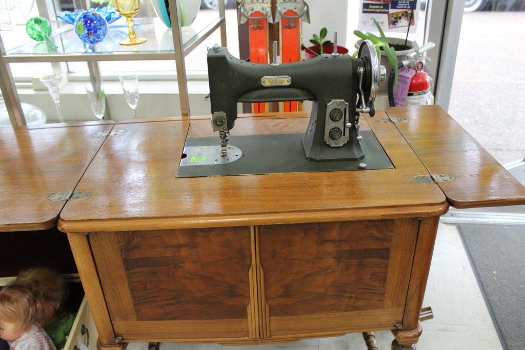 Sewing machine and sewing table at the OHS Thrift Store in Salem