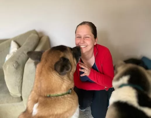OHS Trainer Paulina Tehran posing with her dogs